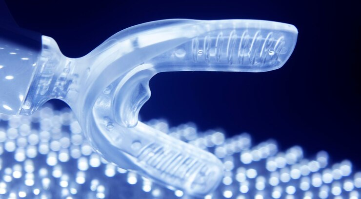 Close up mouthguard against lighting equipment 1048944 12733046