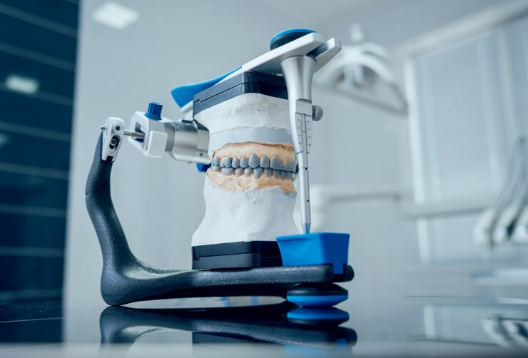 Dental technician working with articulator dental lab 179755 9429